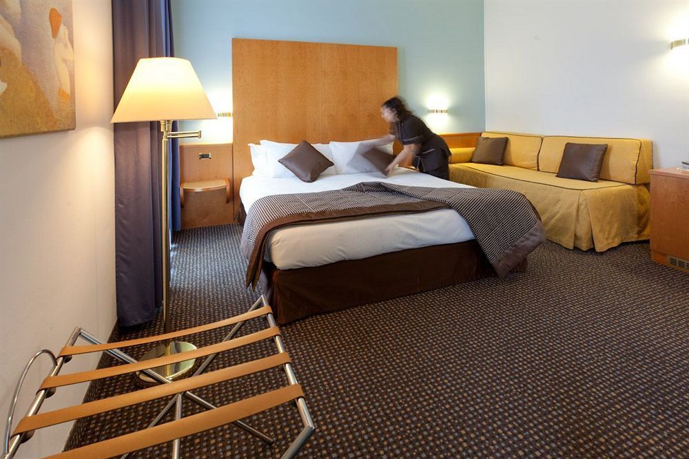 Una Hotels อ็อคคิโอเบลโล ภายนอก รูปภาพ