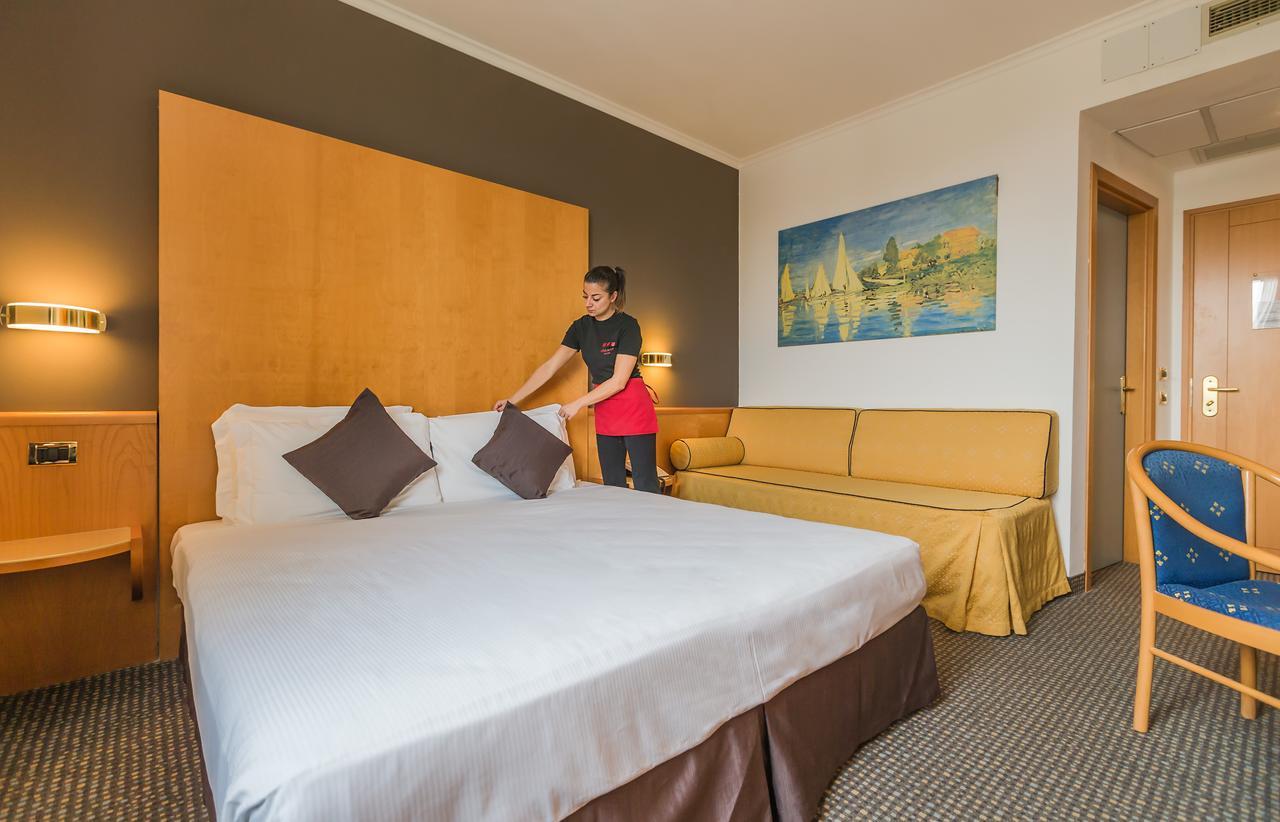 Una Hotels อ็อคคิโอเบลโล ภายนอก รูปภาพ